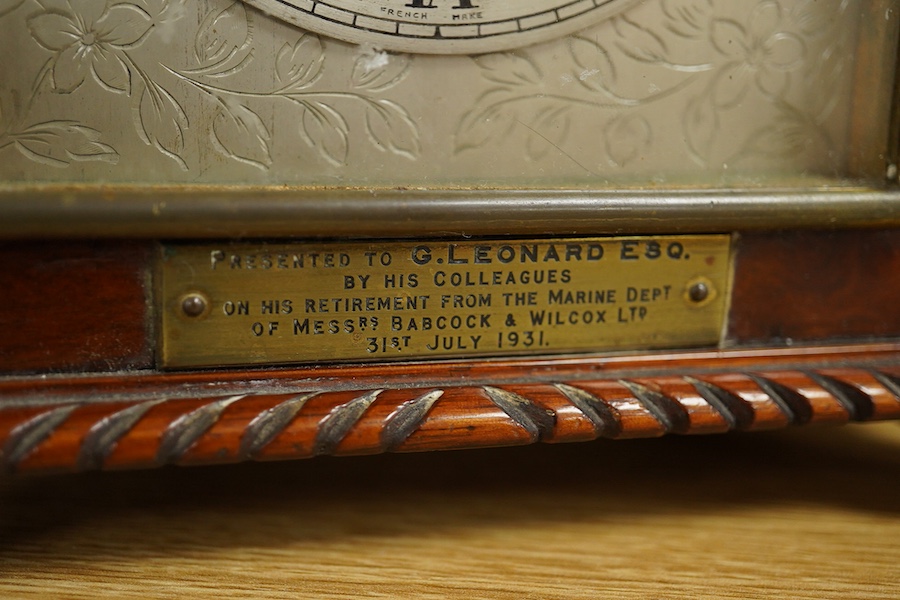 A mahogany mantel clock, retailed by J. W. Benson, c.1930, with engraved silvered dial, with key, 27cm high. Condition - good, untested